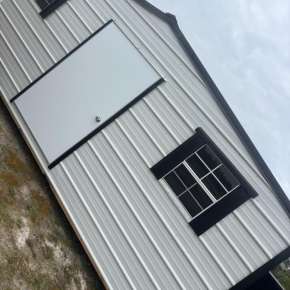 white metal building with black accents Smiths Buildings Augusta GA white metal building with black accents Smiths Buildings Augusta GA